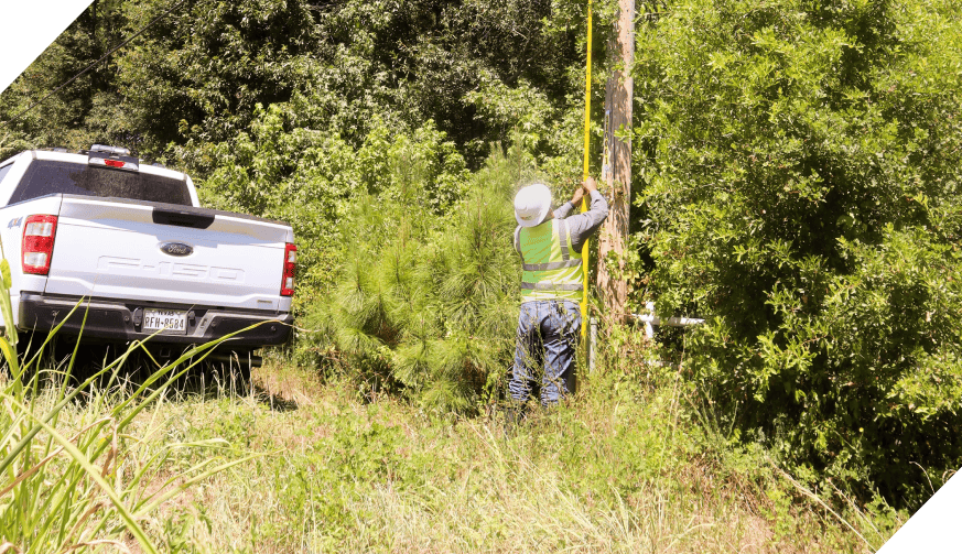 rei worker working in the field